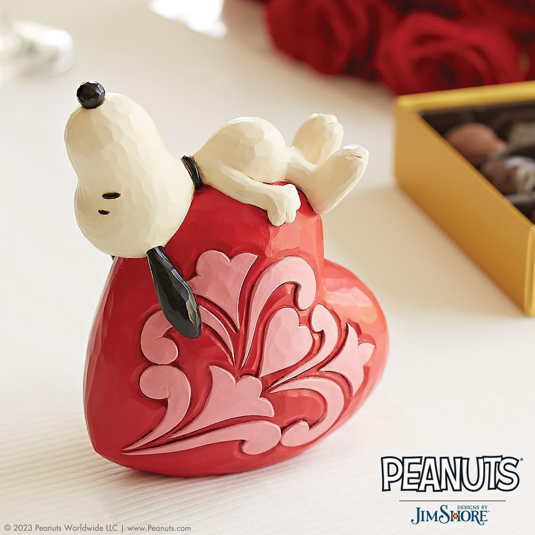 Enesco Peanuts by Jim Shore Snoopy Laying on Heart Figurine I28696